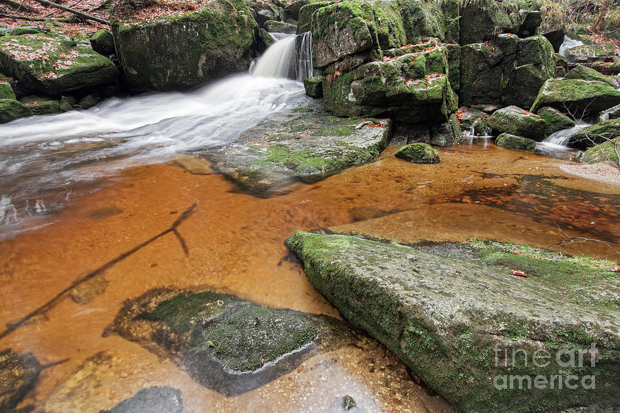 Flowing water through boulders on a forest creek Photograph by Michal Boubin