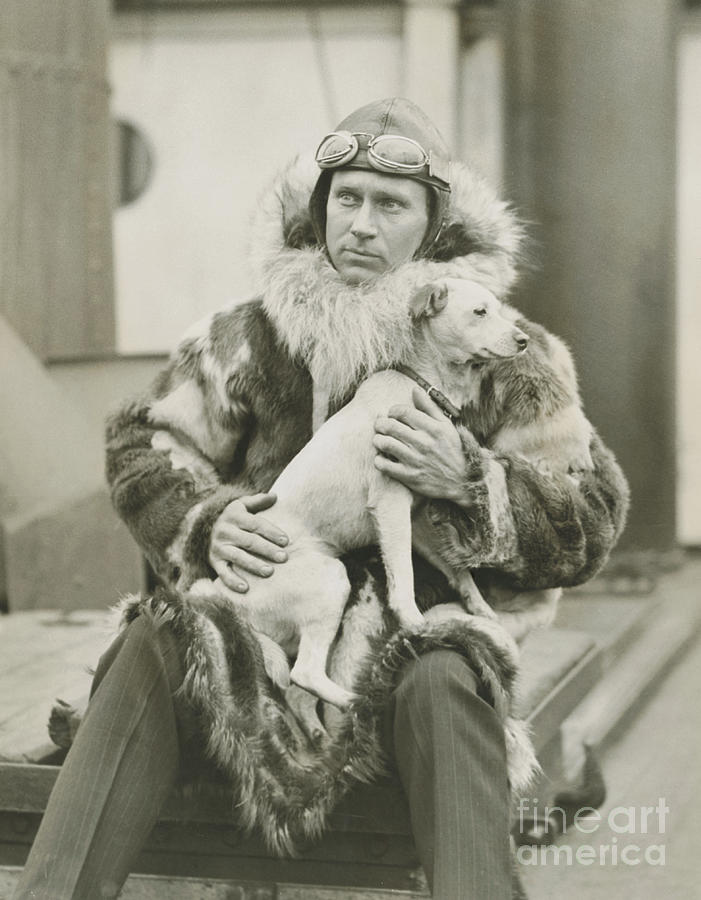 Floyd Bennett Holding Dog Photograph by Bettmann
