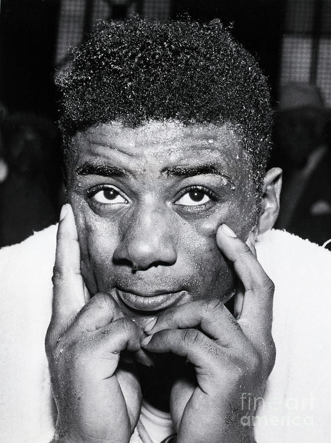 Floyd Patterson With Hands At Face Photograph by Bettmann