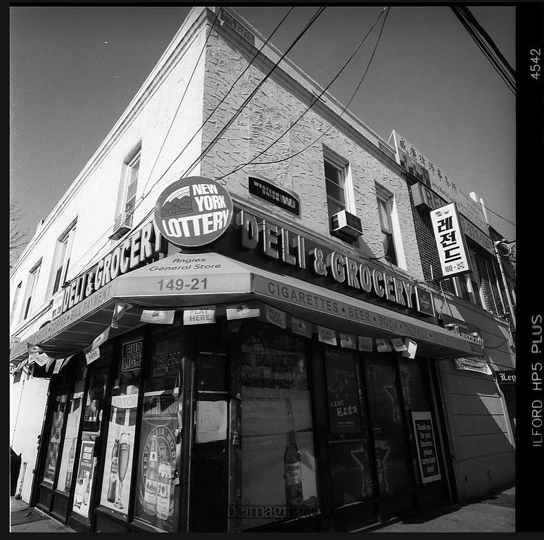 Flushing Queens candy store Photograph by Christian Kellberg