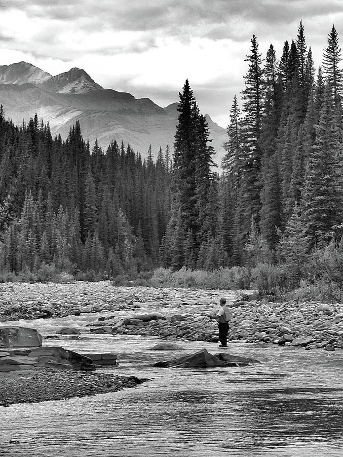 Black And White Photograph - Fly Fisherman  by Phil And Karen Rispin
