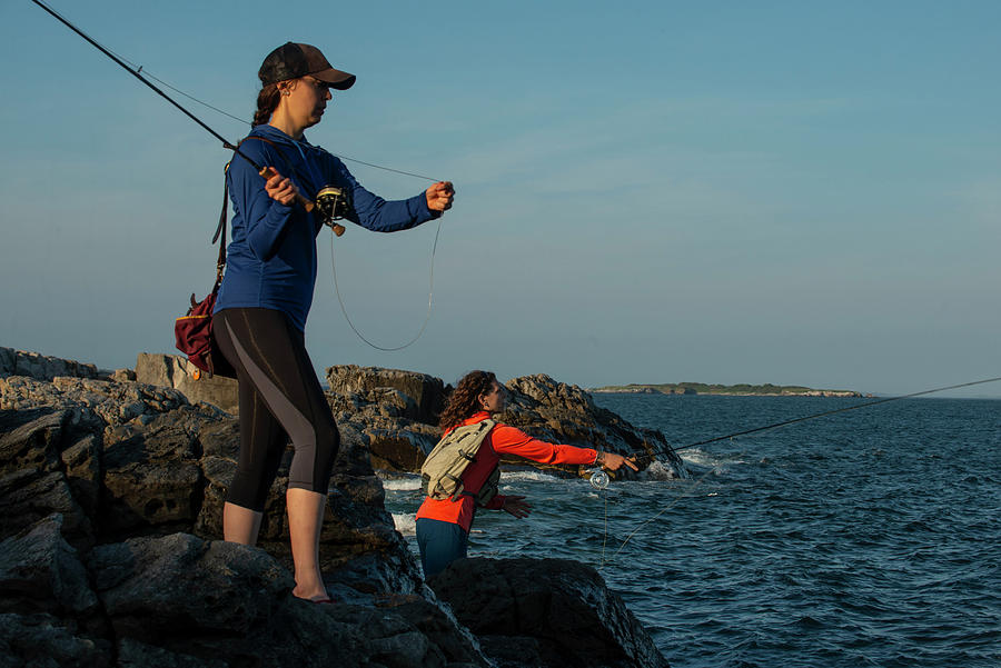 Portland Photograph - Fly Fishing For Striped Bass In Maine by Cavan Images
