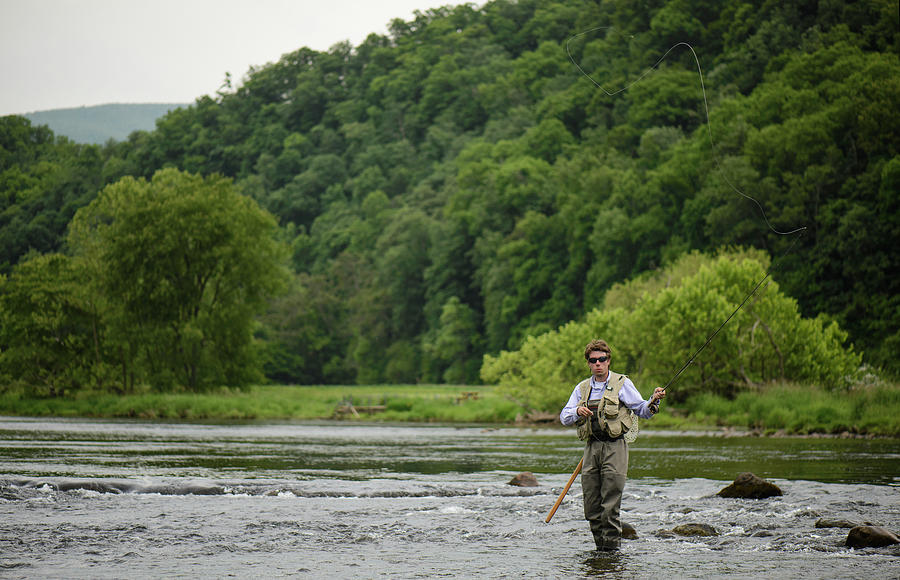 Insects Photograph - Flyfishing On A Southeastern River by Cavan Images