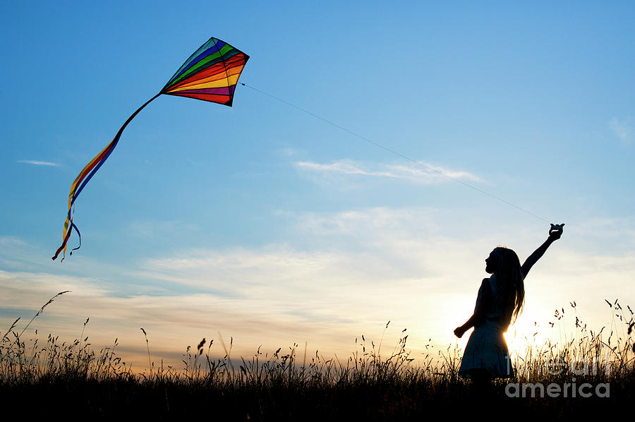 Flying Her Kite Photograph by Tim Gainey