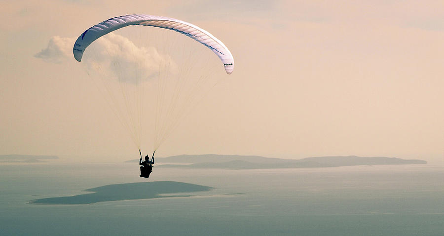 Flying On Cres Sky Photograph by Giovanni Chiaia