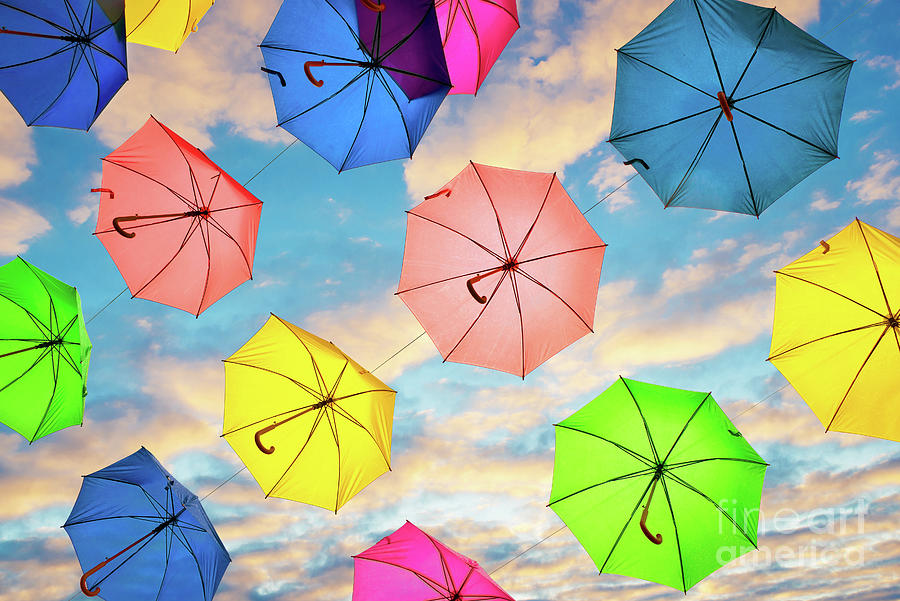 Flying umbrellas Photograph by Delphimages Photo Creations