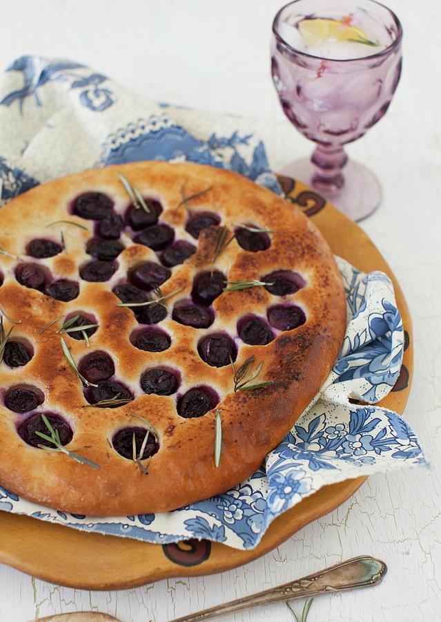 Focaccia With Grapes And Rosemary Photograph by Strokin, Yelena