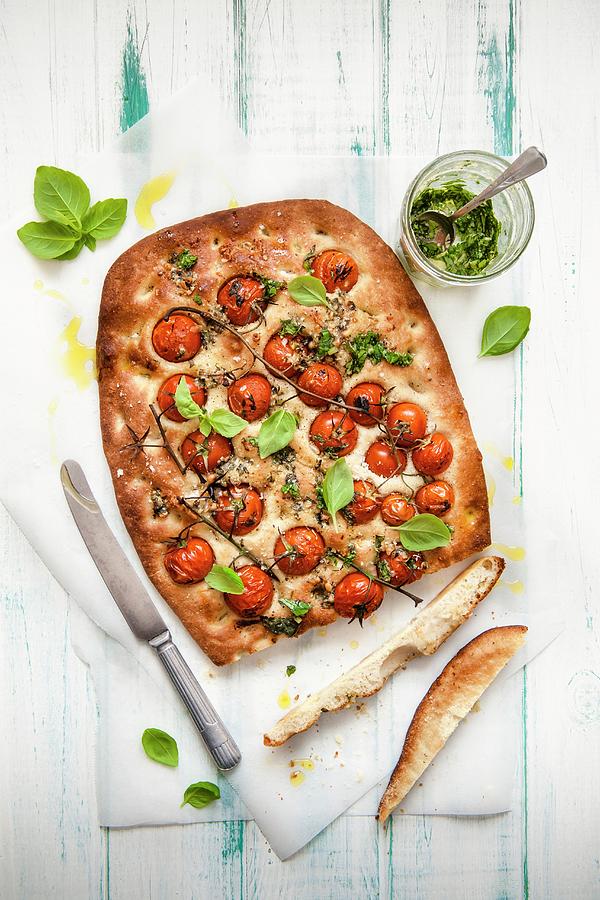 Focaccia With Vine Ripened Tomatoes And Pesto top View Photograph by Magdalena Hendey