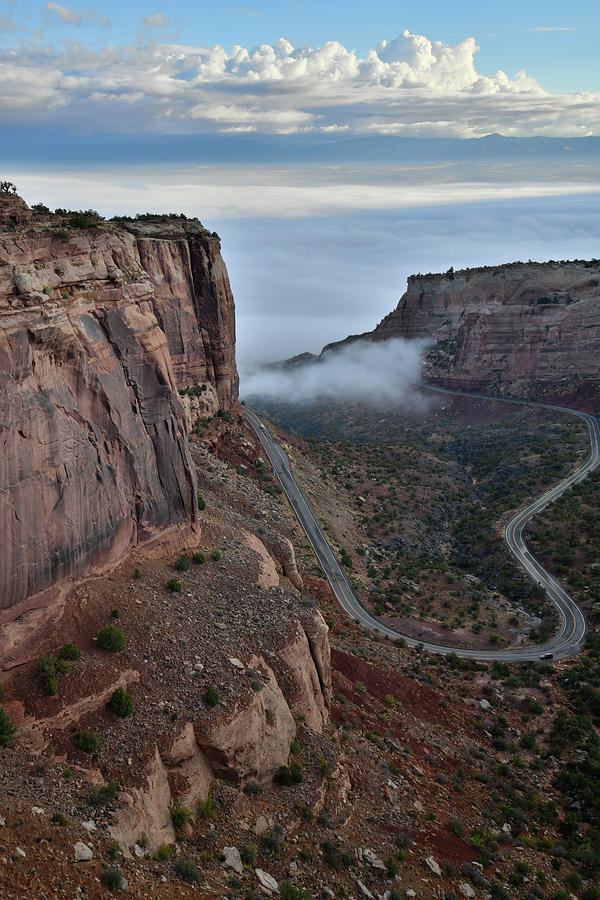 Fog Starts to Roll Up Fruita Canyon Photograph by Ray Mathis