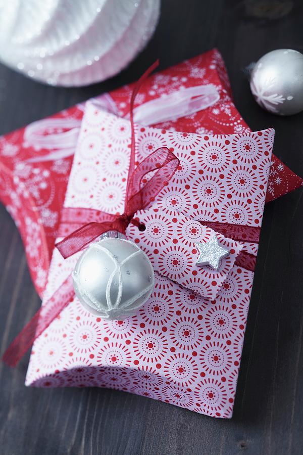 Folded Pillow Boxes Decorated With Small Christmas Tree Baubles Photograph by Franziska Taube