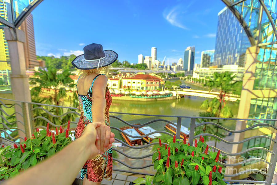 Follow me in Singapore Photograph by Benny Marty