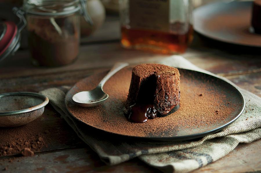 Fondant Au Chocolat Dusted With Cocoa Powder Photograph by Kristy Snell