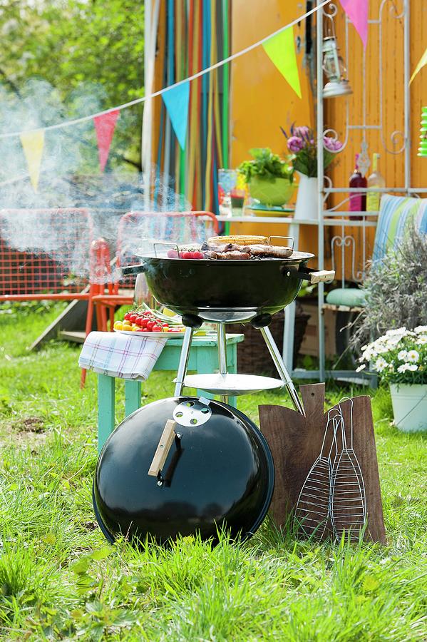 Food On A Barbecue In A Summer Garden Photograph by Manuela Rther