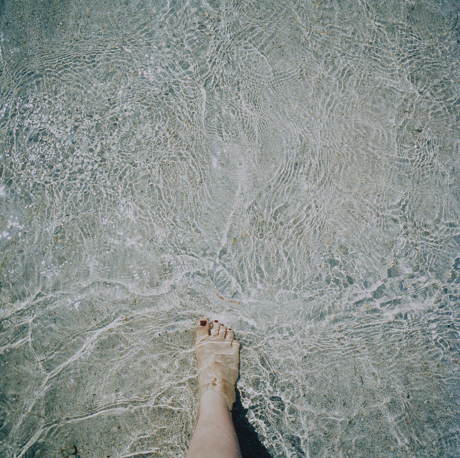 Foot In Water Photograph by Silvia Otte