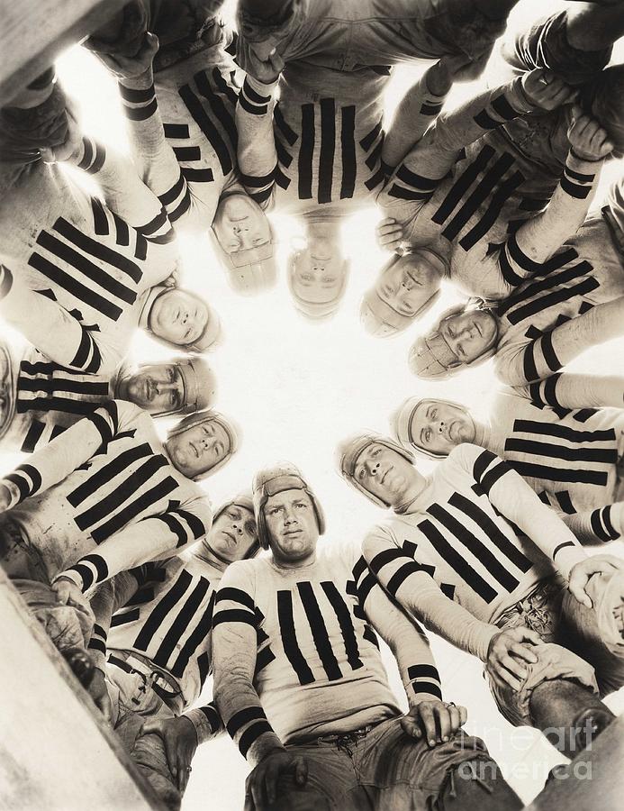 Forming Photograph - Football Huddle by Everett Collection