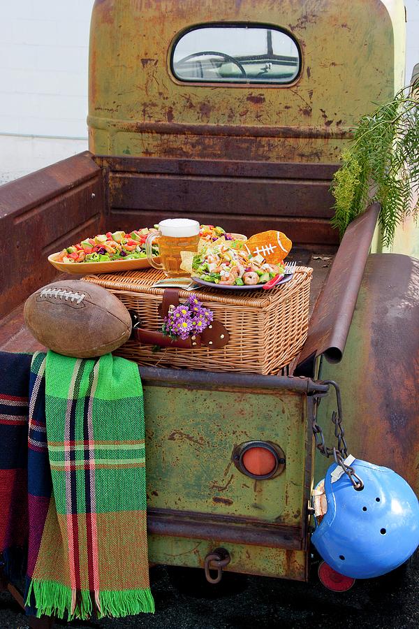 Football Picnic On Old Vintage Truck Photograph by Jon Edwards Photography