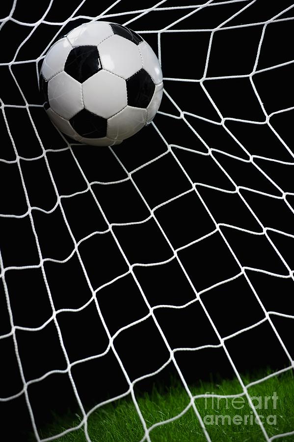 Football Striking On Net, Close Photograph by Westend61