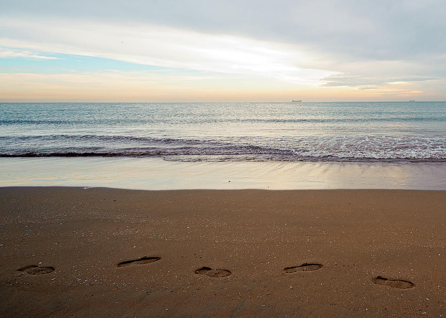 Footprints On Beach Photograph by Haykirdi