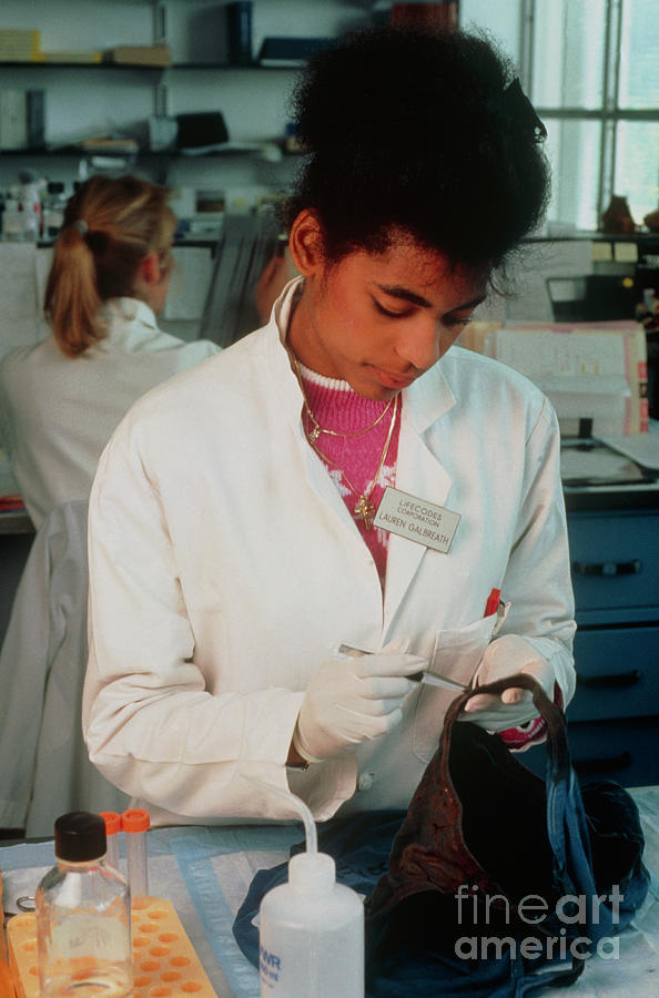Forensic Scientist Taking Blood Sample From Shirt Photograph by Peter Menzel/science Photo Library