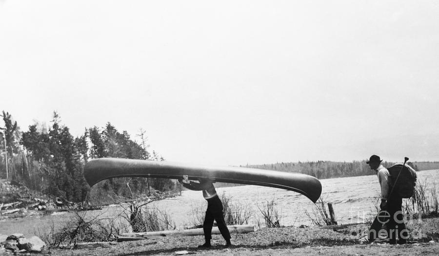 Forest Rangers With Canoe Photograph by Bettmann