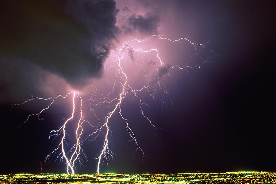 Forks Of Lightning Over City,illu- Photograph by Ralph Wetmore