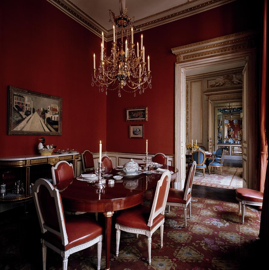 Formal Dining Room With Red Walls And Chairs Photograph by Horst P Horst