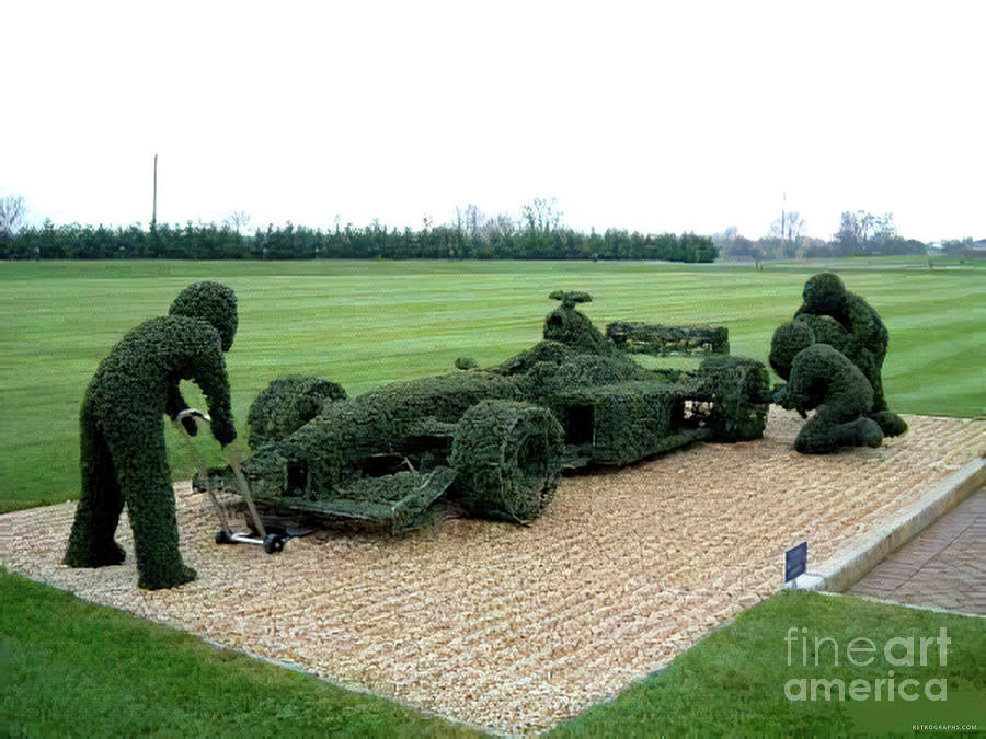 Formula 1 Race Car Made Into Shrubs With Pit Crew Photograph by Retrographs