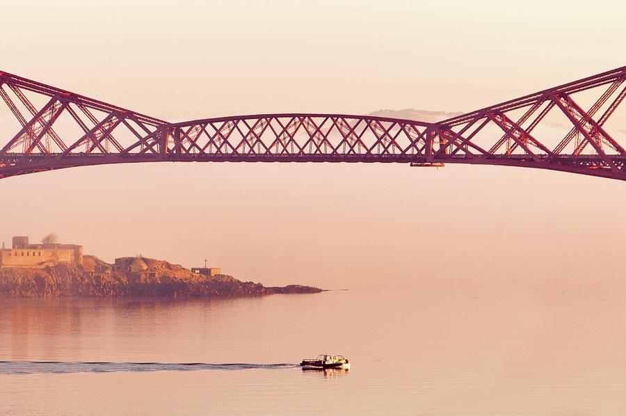 Forth Rail Bridge In Fog With Boat Photograph by Paul Myers-bennett
