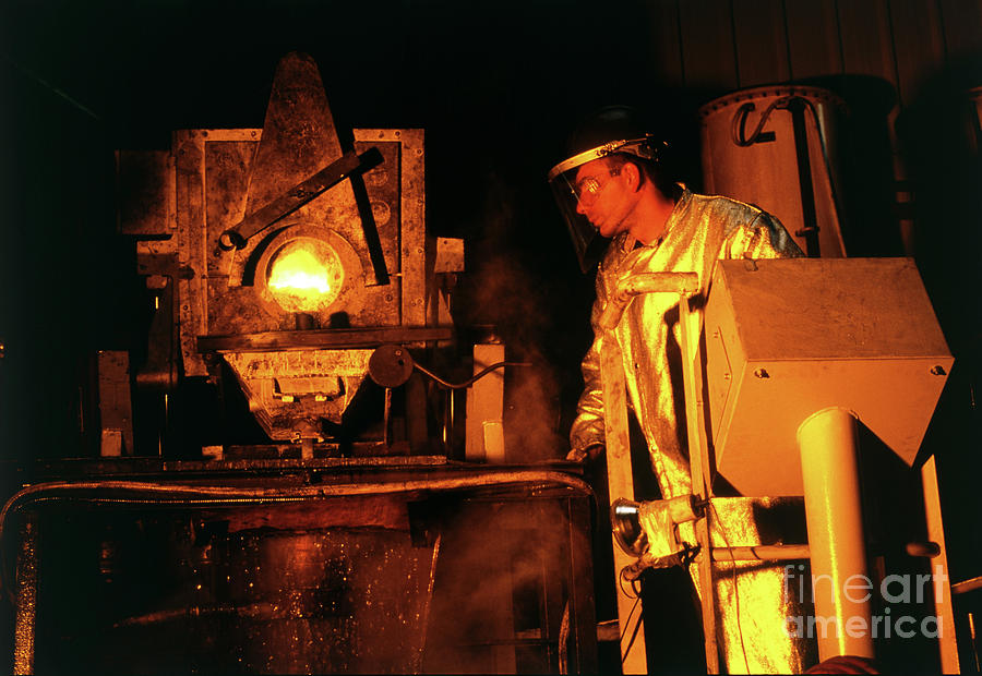 Foundrymen Casting Blocks Of Molten Metal Photograph by Pascal Goetgheluck/science Photo Library