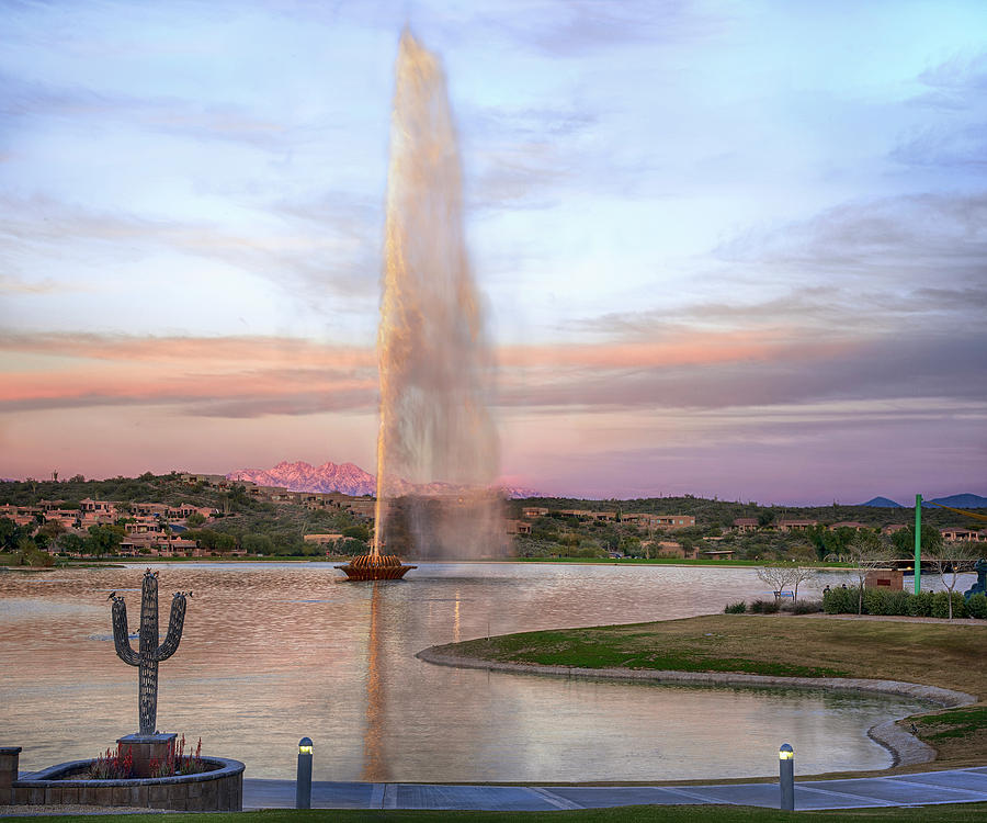 Fountain at Fountain Hills Arizona in front of snow capped Four Peaks