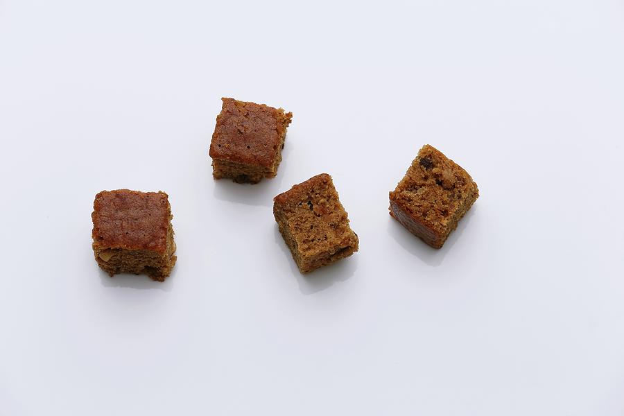 Four Cubes Of Gingerbread Photograph by Jalag / Michael Bernhardi