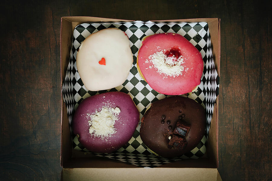 Four Gourmet Donuts In A Box Photograph by Theresa Scarbrough