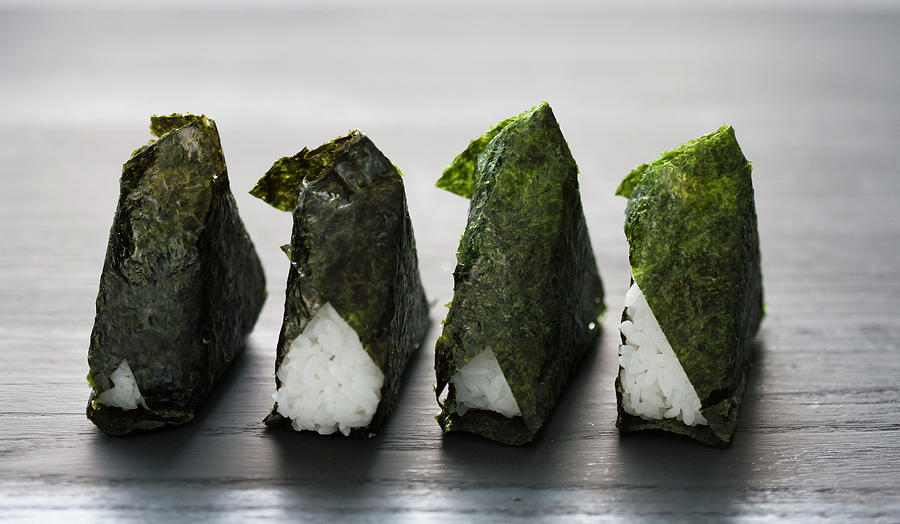 Four Ongiri Leaves Filled With Umeboshi japan Photograph by Martina Schindler