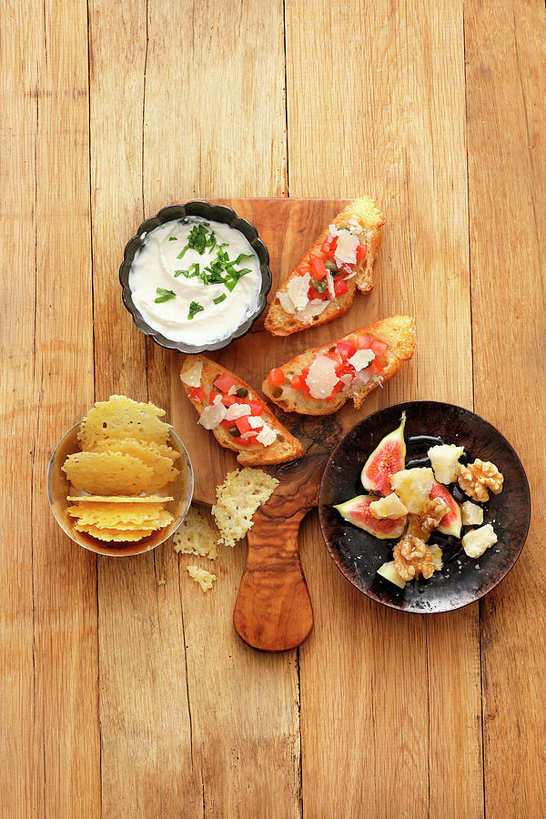 Four Snacks With Parmesan Photograph by Mathias Stockfood Studios / Neubauer