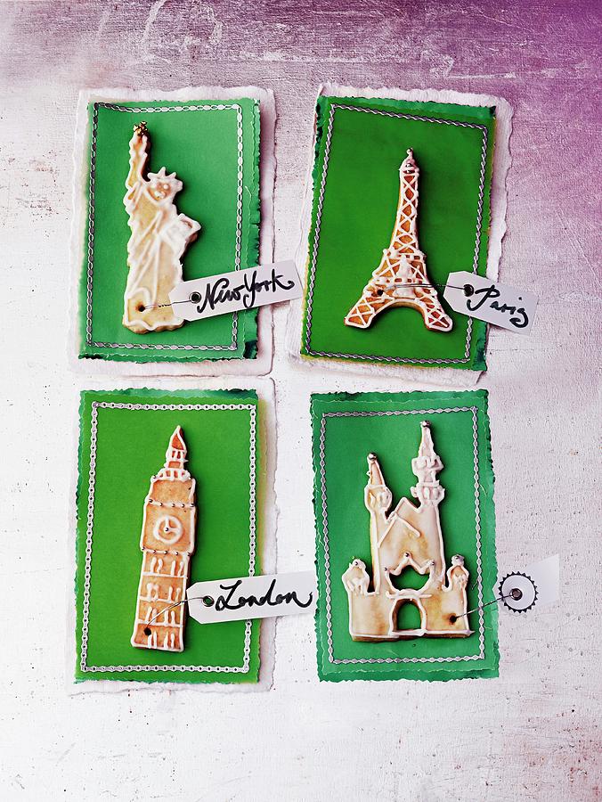 Four Travel Vouchers Decorated With Iconic Landmark Biscuits Photograph by Jalag / Julia Hoersch