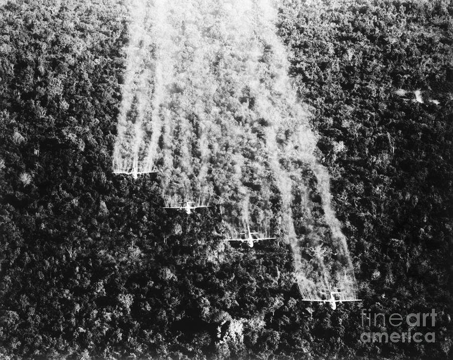 Four Usaf Planes Spraying Defolient Photograph by Bettmann