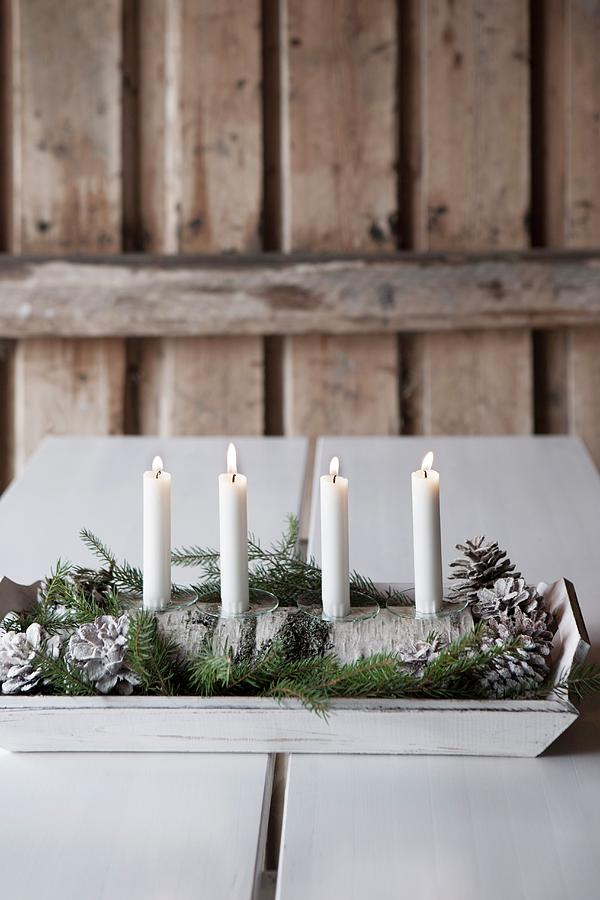 Four White Candles In Diy Candelabra Made From Half A Birch Log On Wooden Tray Photograph by Annette Nordstrom
