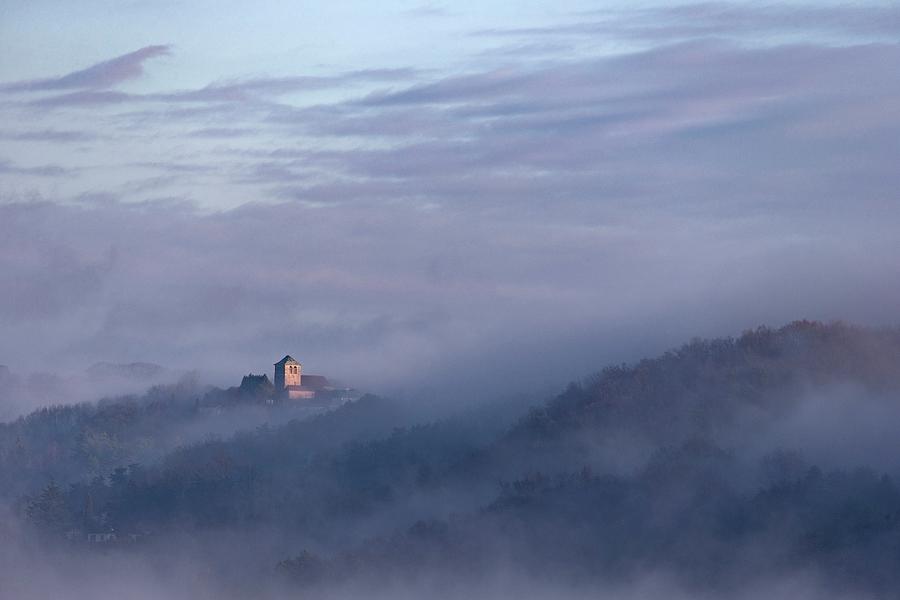 France, Aquitaine-limousin-poitou-charentes, Correze, Dordogne Valley Near Curemonte, The Church Of Puy Darnac Surrounded By Mist Digital Art by Tim Mannakee