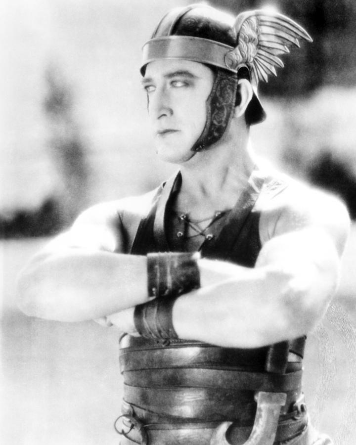 Movie Photograph - Francis X. Bushman Standing With Arms Crossed by Globe Photos