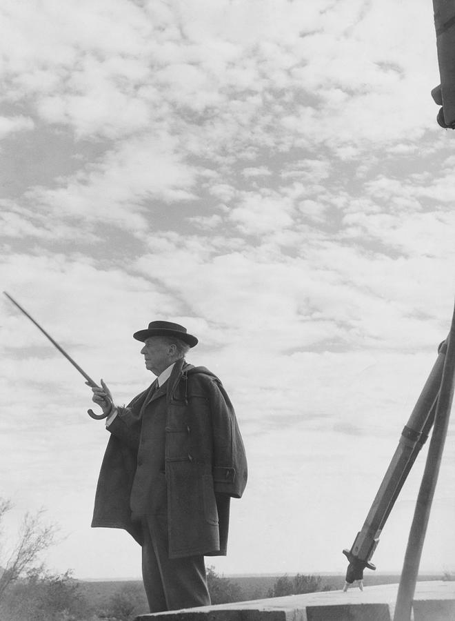 Black And White Photograph - Frank Lloyd Wright With His Cane by Howard Dewald