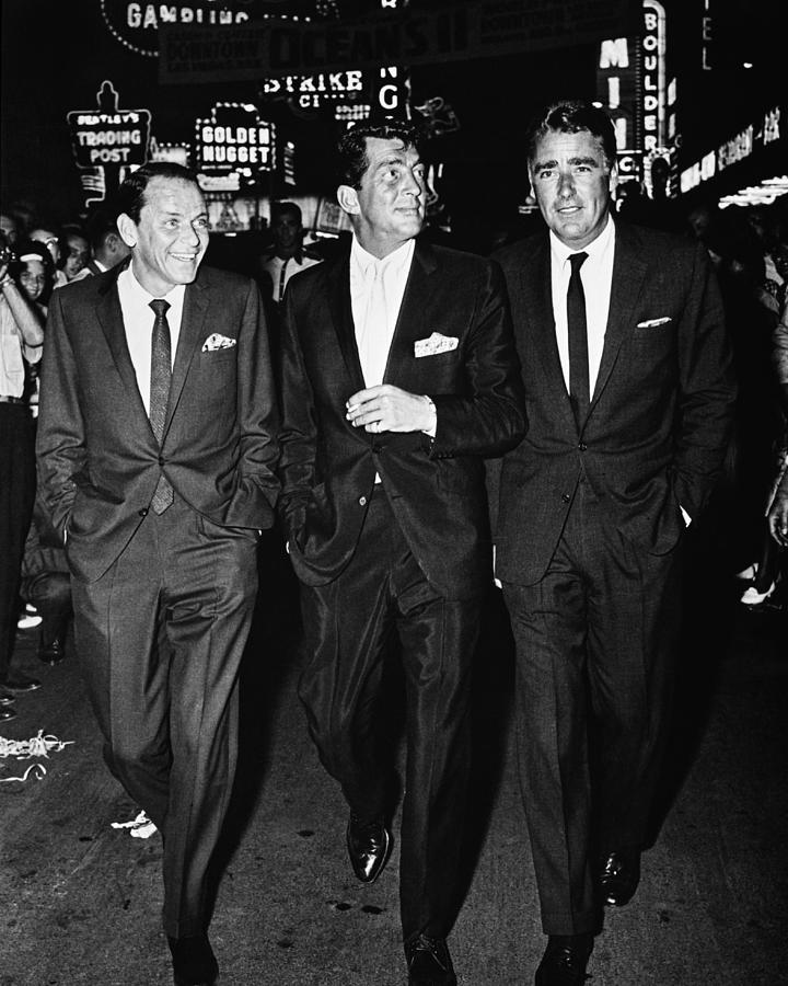 Frank Sinatra Photograph - Frank Sinatra, Dean Martin And Peter Lawford Walking Down The Las Vegas Strip by Globe Photos