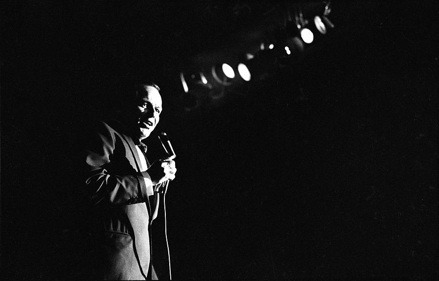 Frank Sinatra on stage at the Sands Hotel and Casino where he is performing with Count Basie and the the Count Basie Band. Photograph by John Dominis