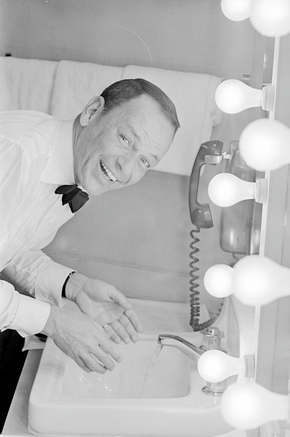 Frank Sinatra Washing Face Photograph by John Dominis