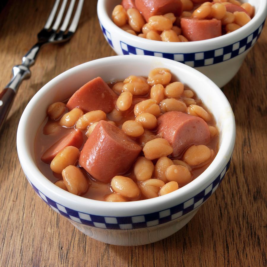 Frankfurters With Baked Beans In Two Serving Bowls Photograph by Paul ...