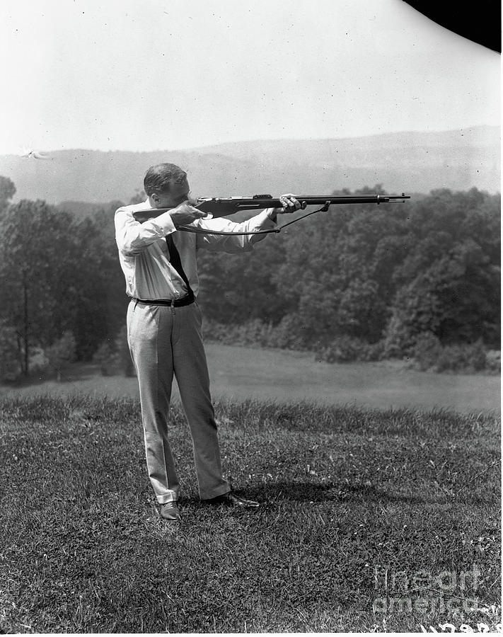 Franklin D. Roosevelt Aiming Rifle Photograph by Bettmann