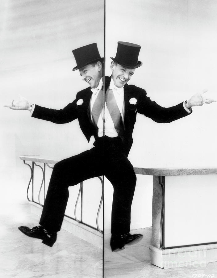 Fred Astaire Dancing Along Mirror Photograph by Bettmann