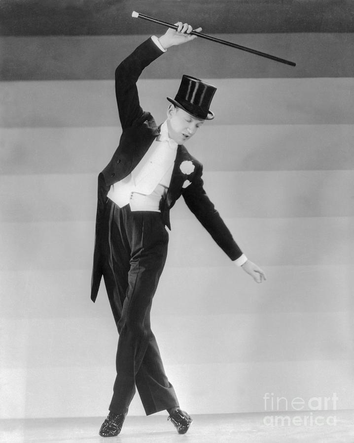Fred Astaire Wearing Tuxedo And Dancing Photograph by Bettmann