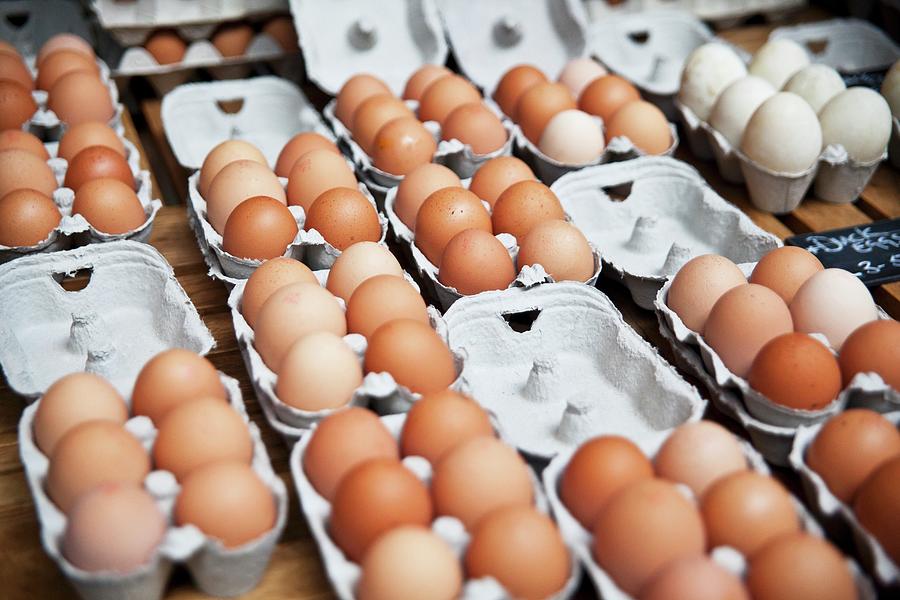 Free Range Eggs In Egg Boxes At A Market Photograph by George Blomfield