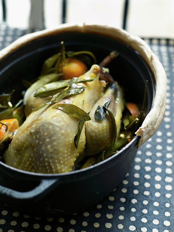 Fruit Photograph - Free-range Guinea-fowl With Clementines Cooked In A Casserole Dish Sealed With Pastry by Amiel