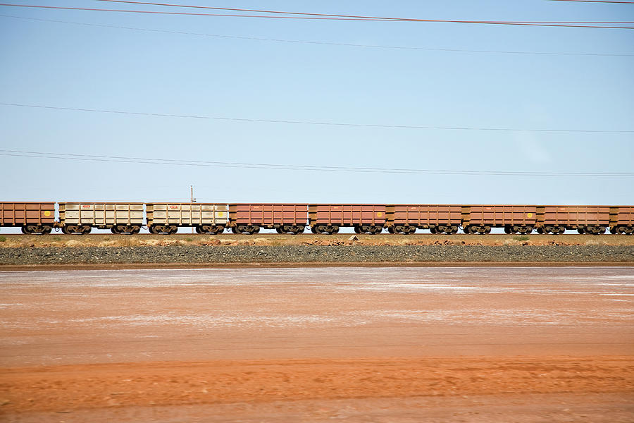 Freight Train Moving Through A Desert Photograph by Tobias Titz